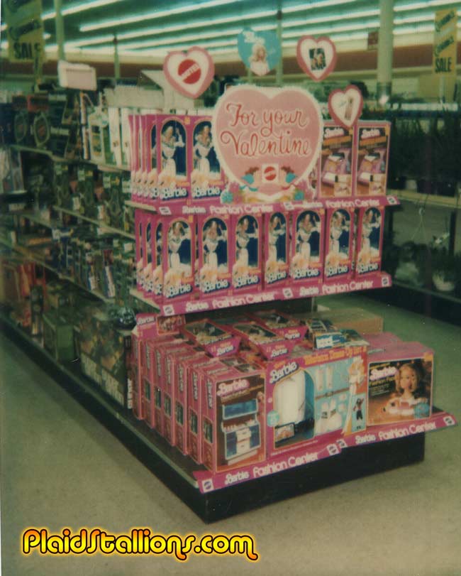 an endcap of barbie toys in the 1980s
